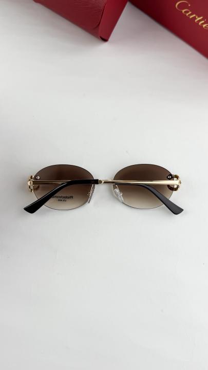 Cartier gold brown 1050